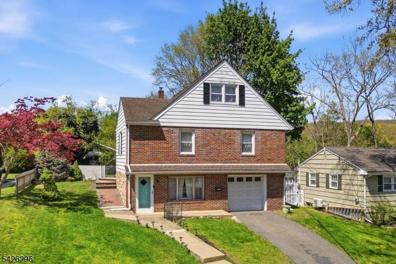 Charming brick Cape style home with 3 bedrooms and 1.