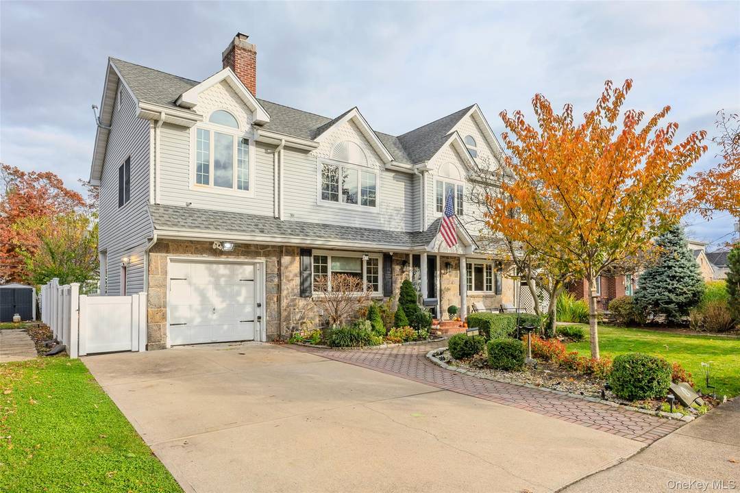 TURN KEY HOME ! ! In the Prestigious Oaks section, this beautifully Sun Drenched colonial offers the perfect blend of classic charm and modern living.