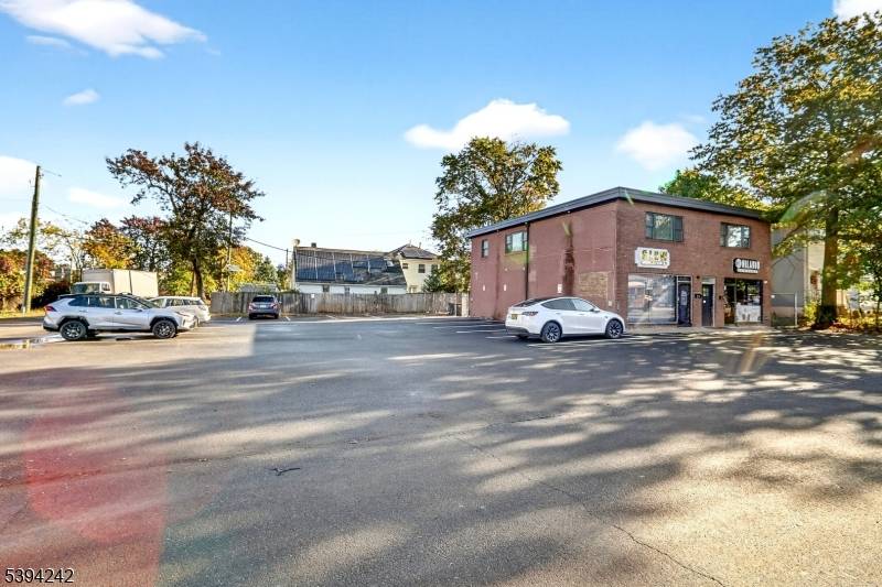 Discover an outstanding investment opportunity with this fully renovated, income generating building featuring four separate units.