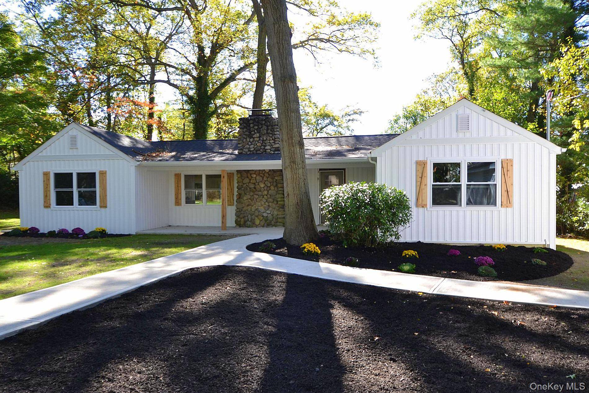 Ultra private and beautifully renovated sprawling ranch offering modern comfort and style throughout.