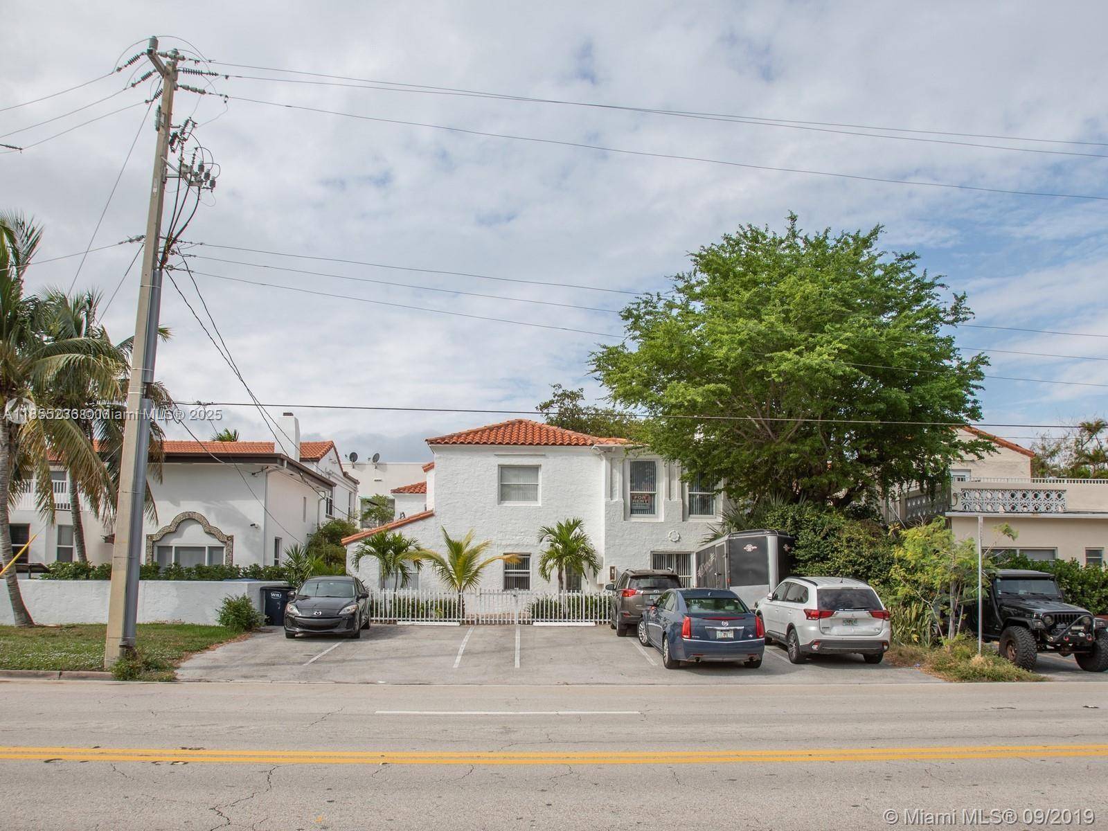 Discover the potential with this Spanish style, multi family building Quadruplex, nestled in the heart of Mid Beach s Mid Beach neighborhood and along the highly desirable Pine Tree Drive.