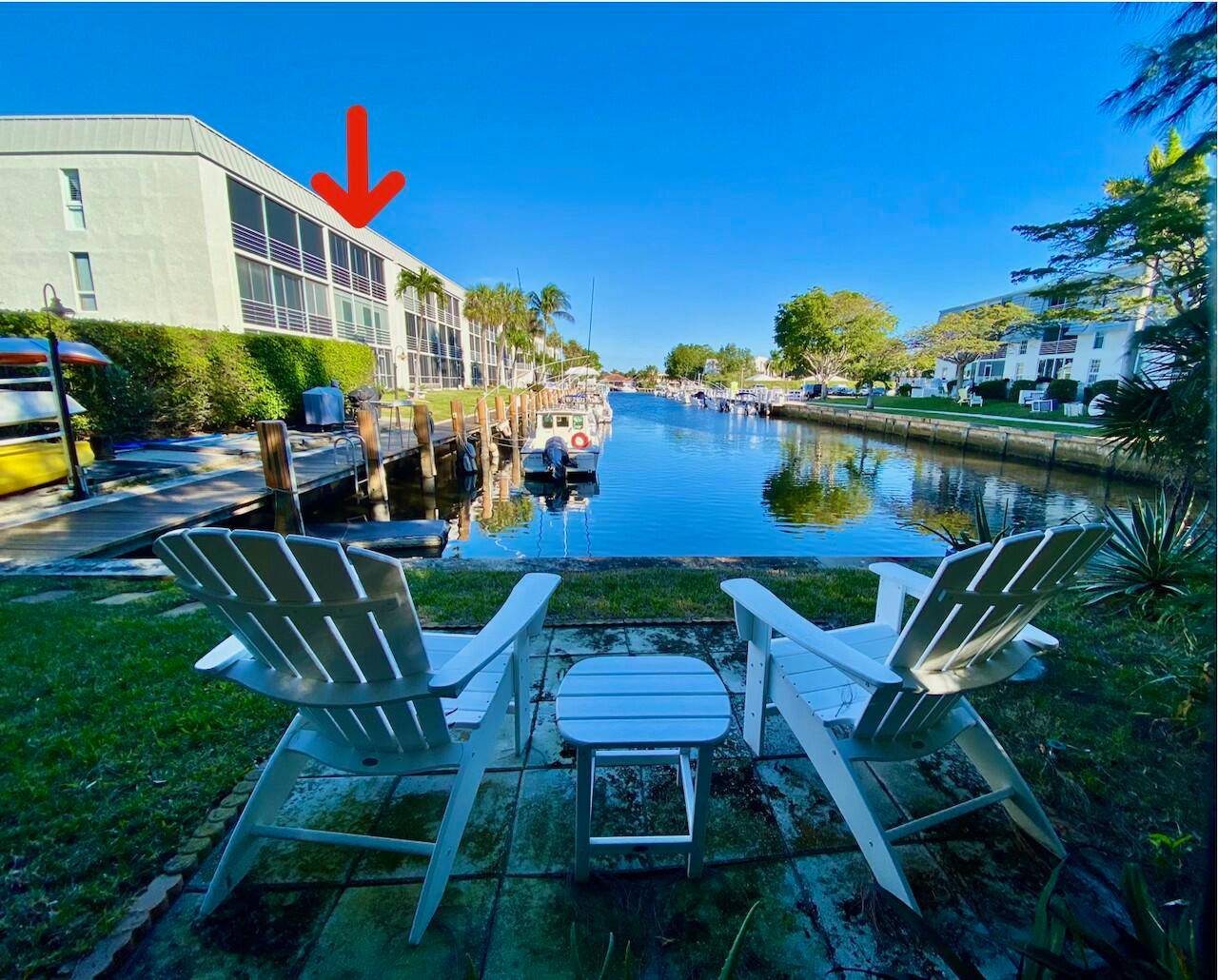 Enjoy Coastal Living in this updated waterfront condo in East Boca Raton overlooking the dock and canal.