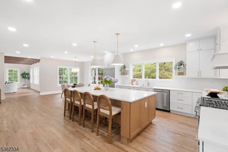 Step into timeless sophistication with this newly expanded 6 bedroom, 5 full bath luxury home, thoughtfully designed to blend elevated modern living with enduring quality.
