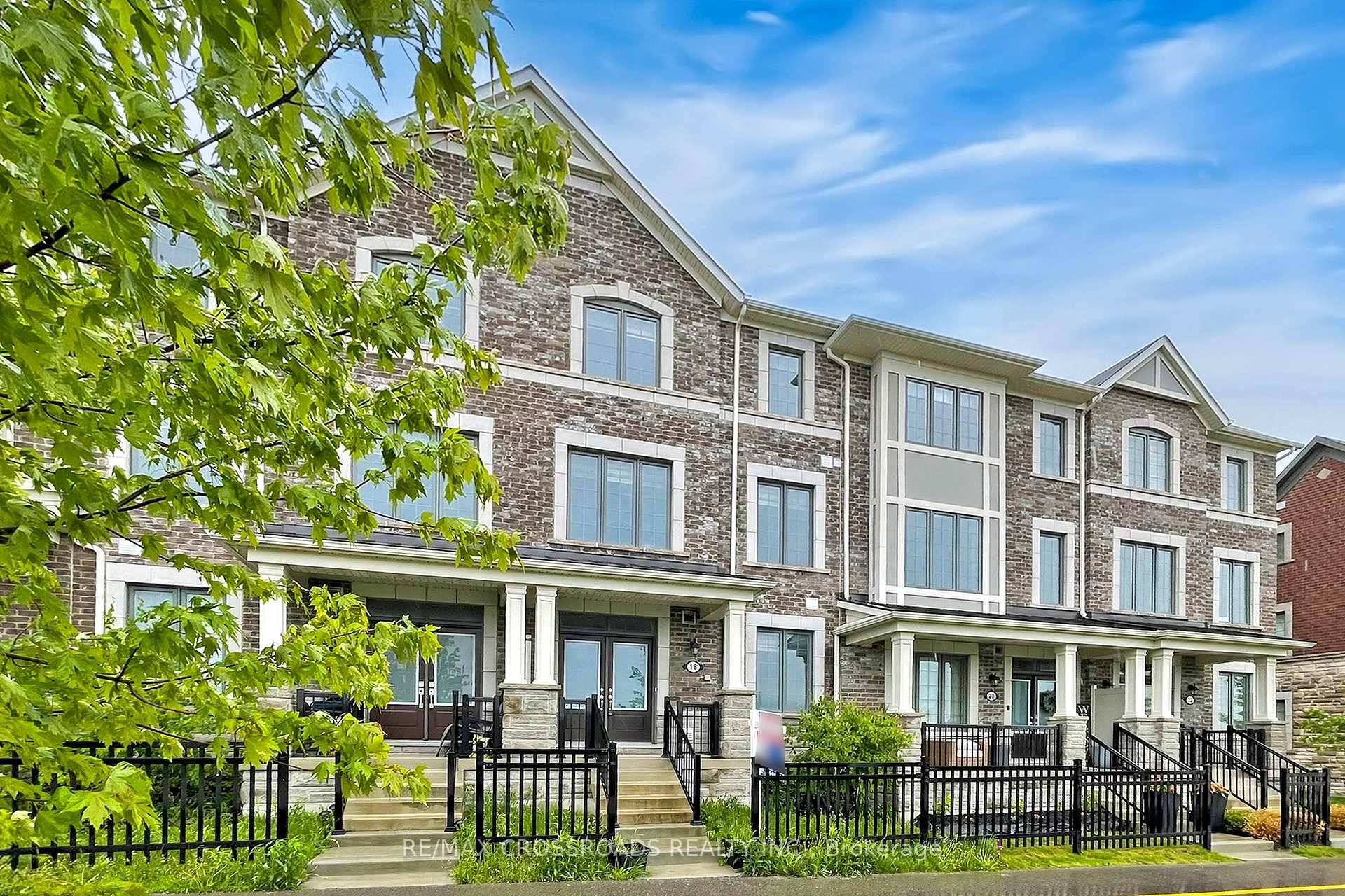 Welcome to 18 Fiesta Way A Rare Double Garage Freehold Townhouse in Whitby !