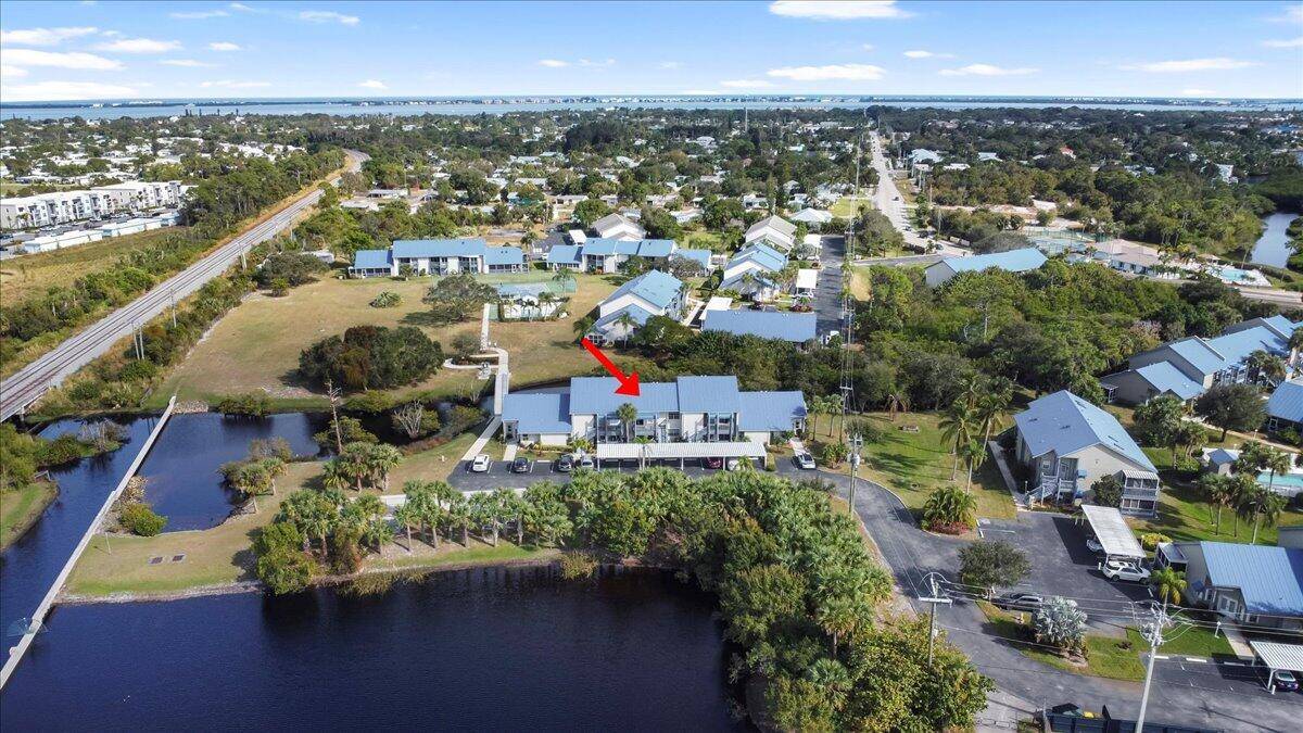 BOATING PARADISE ! Discover this adorable 2 bedroom, 1 bath unit located in the Sailfish Village boating community.