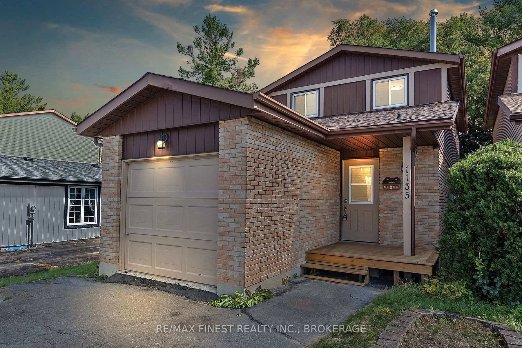 Wonderful 3 bedroom, 3 bathroom family home in Cataraqui Woods with private fenced backyard backing onto green space with access to Cataraqui Woods Park.