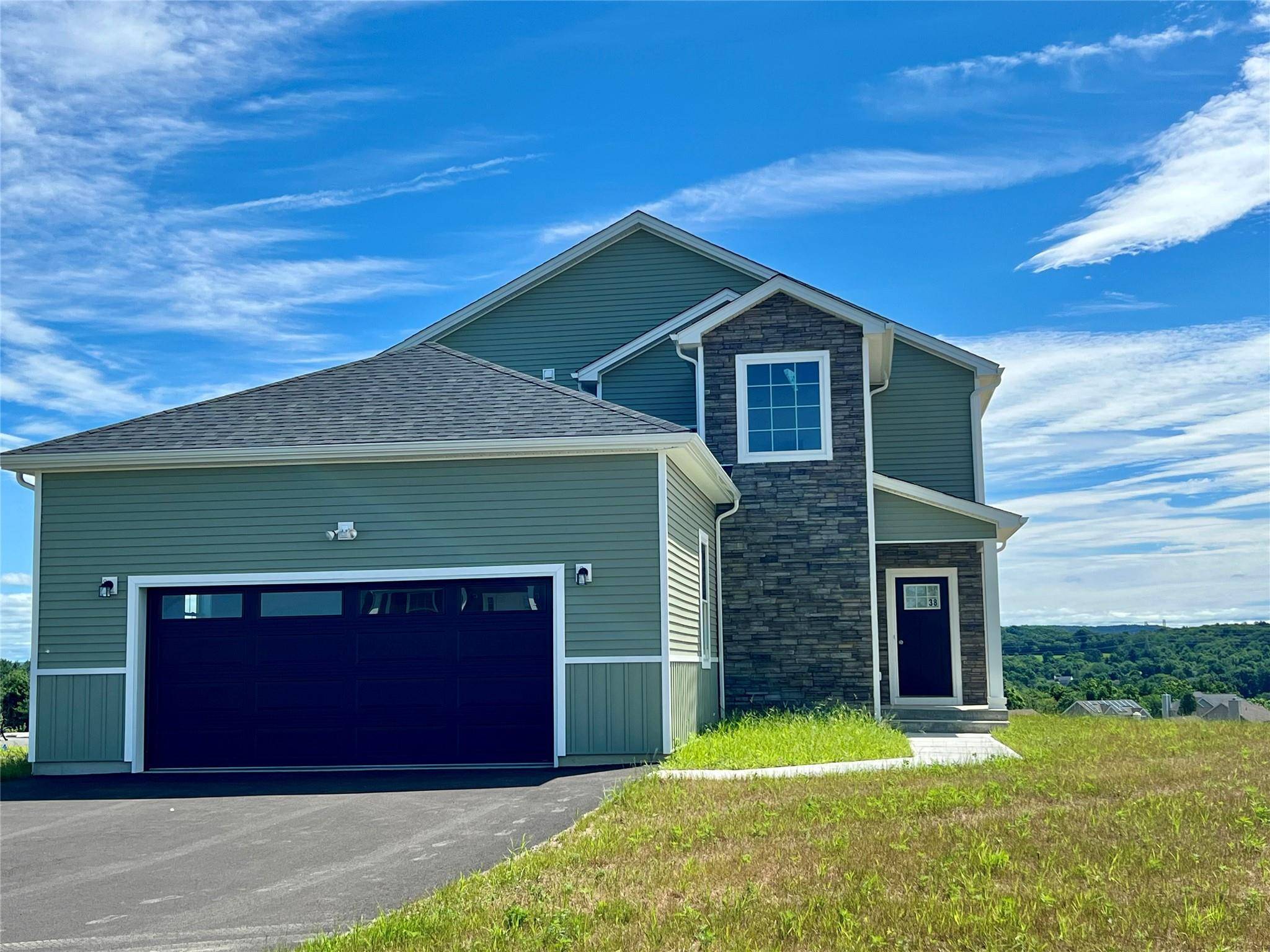The Harley boasts an impressive first floor featuring a stunning open floor plan that offers enchanting views of the spacious great room and the inviting casual dining area, seamlessly extending ...
