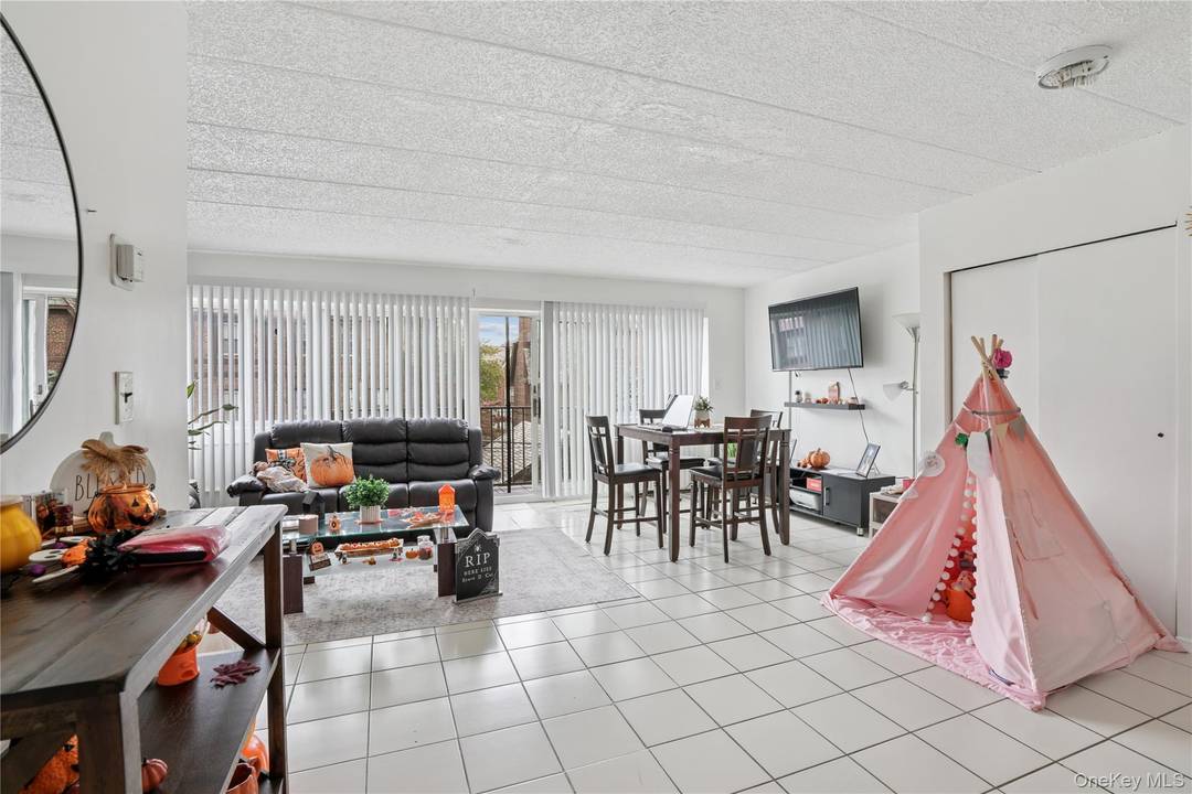 Five Family Brick Home Excellent Condition Garage Basement Welcome to this exceptional five family property in one of Jackson Heights most convenient and desirable locations.