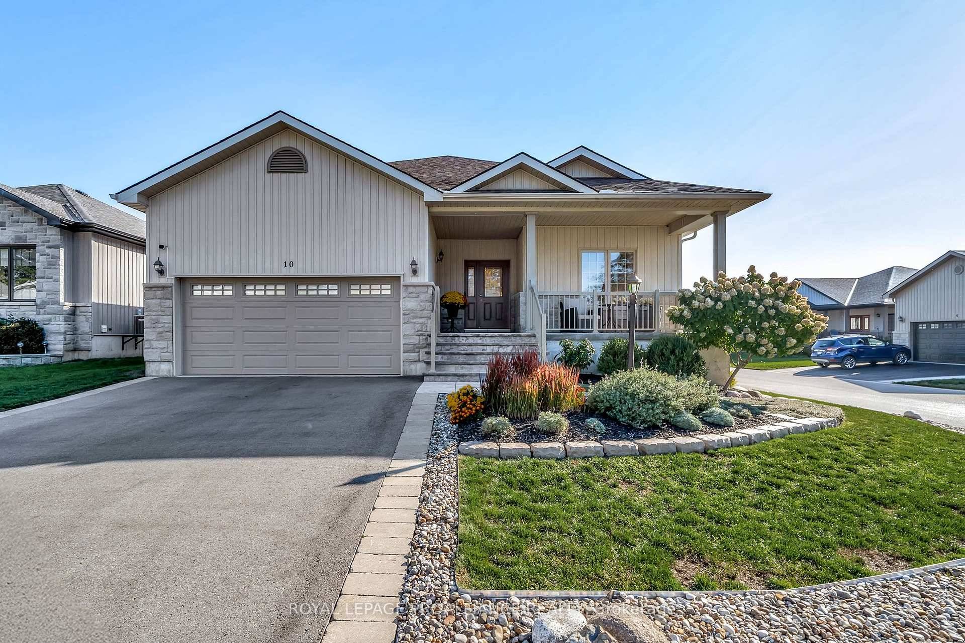 Welcome to 10 Conger Drive, located in the highly sought after Wellington on the Lake 55 retirement community.