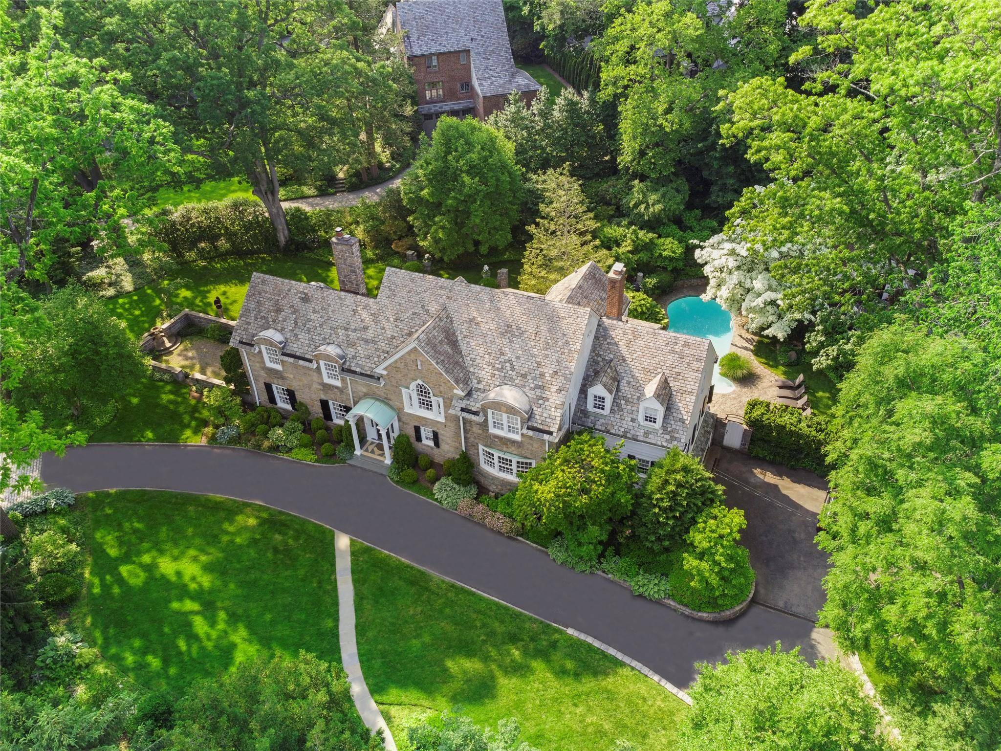 Step into a realm of unparalleled elegance with this stunning five bedroom, five and a half bath masterpiece located in Lawrence Park West.