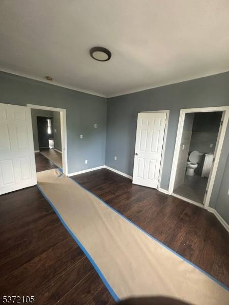 This distinguished three family residence offers three individual units, ideally positioned near downtown Newark.