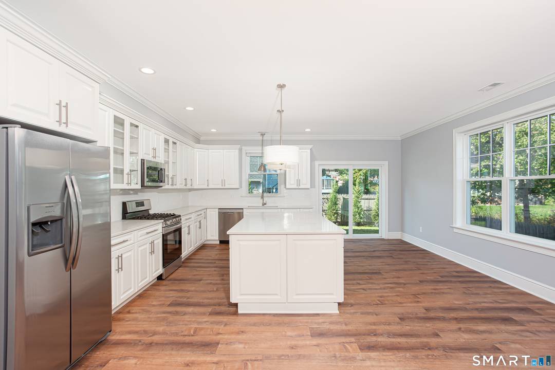 Tucked away at the end of a quiet dead end street, this beautifully maintained property consists of two half duplex units, offering in each approximately 1, 950 square feet of ...