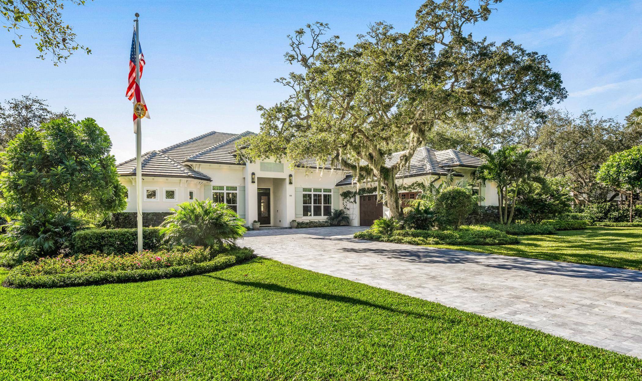 Exquisitely built in 2021, showcasing luxurious finishes and well appointed details throughout this custom home.