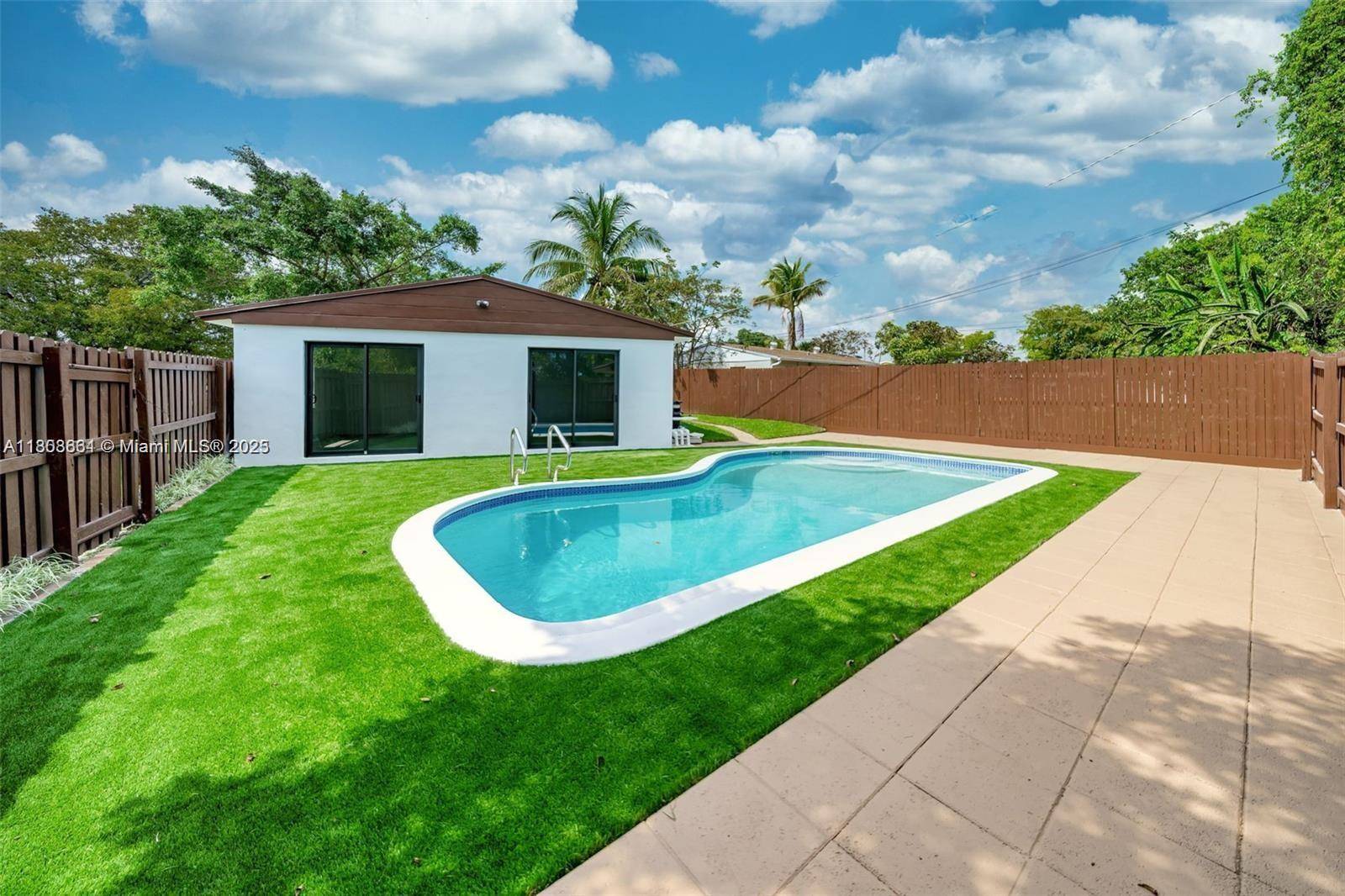 NO HOA, Beautifully renovated corner lot home located just minutes from the beaches of Hollywood.