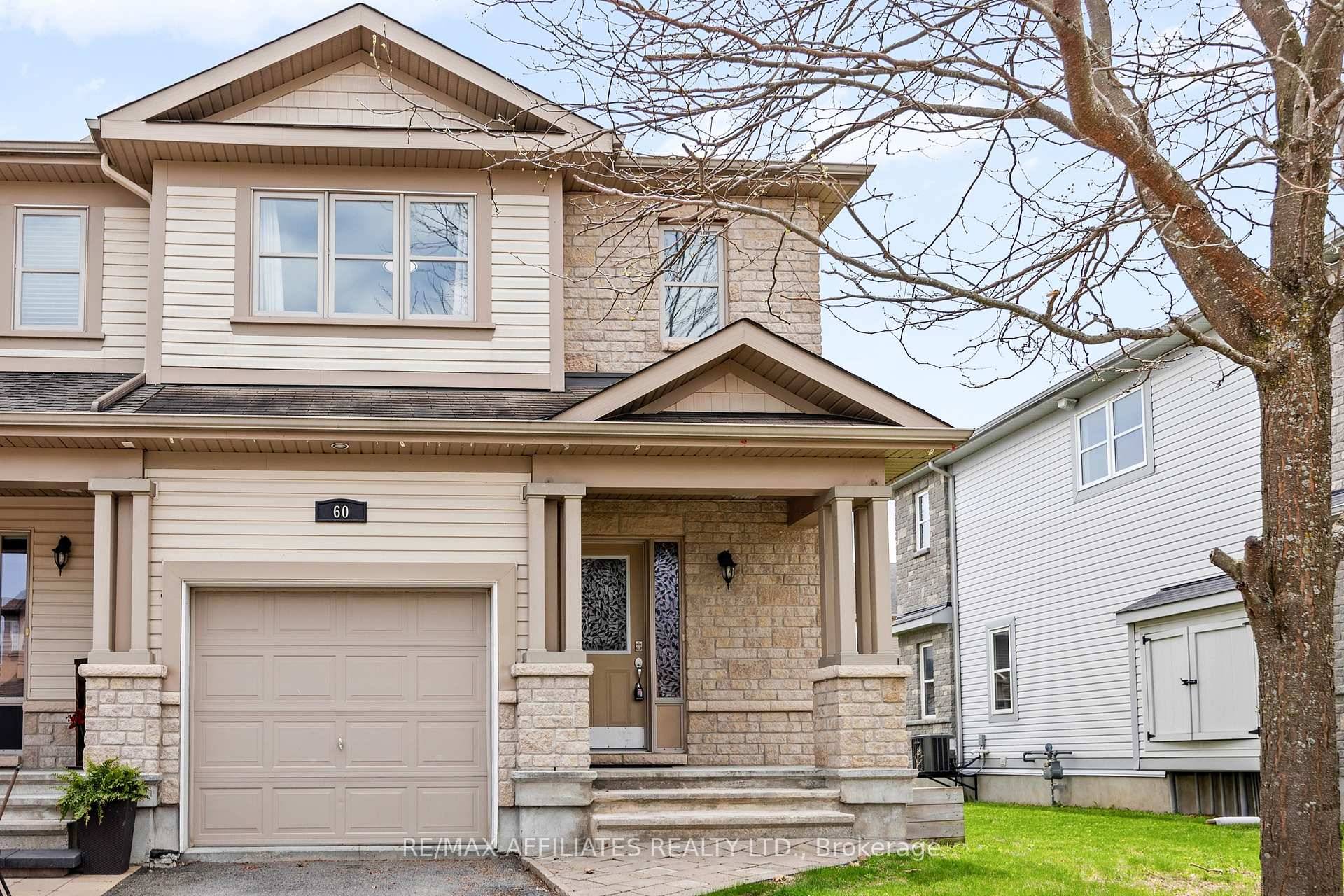 This lovely two storey end unit townhome is located in the heart of Carleton Place.