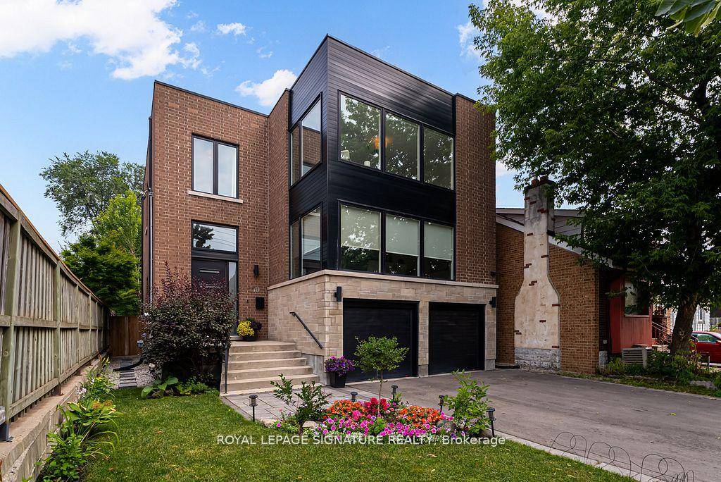 Welcome to 110 Evans Avenue A Rare Custom Built Gem in the Heart of Mimico Set on an oversized 40' 120' lot, this stunning contemporary residence offers a perfect balance ...
