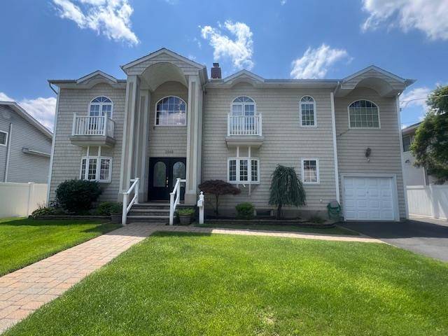 Beautiful Redone Center Hall Colonial This house has 4 5 Bedrooms with 5 full bathrooms, new plumbing, new electric, all new windows.