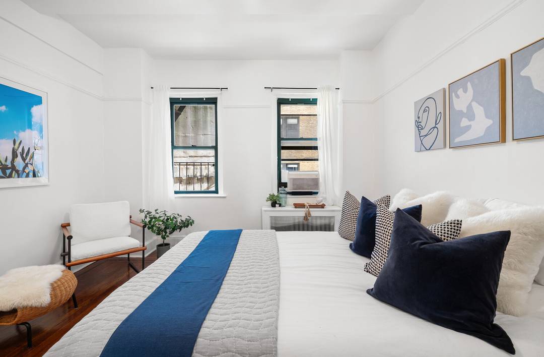 Welcome to this inviting one bedroom residence on the corner of Central Park, where classic charm meets a thoughtful layout and comfortable living.
