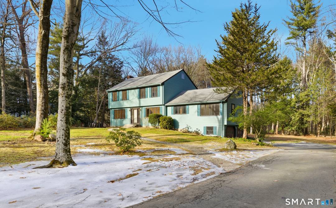 Located at the end of a quiet cul de sac and bordered by scenic forested open space, this inviting 4 bedroom, 3.