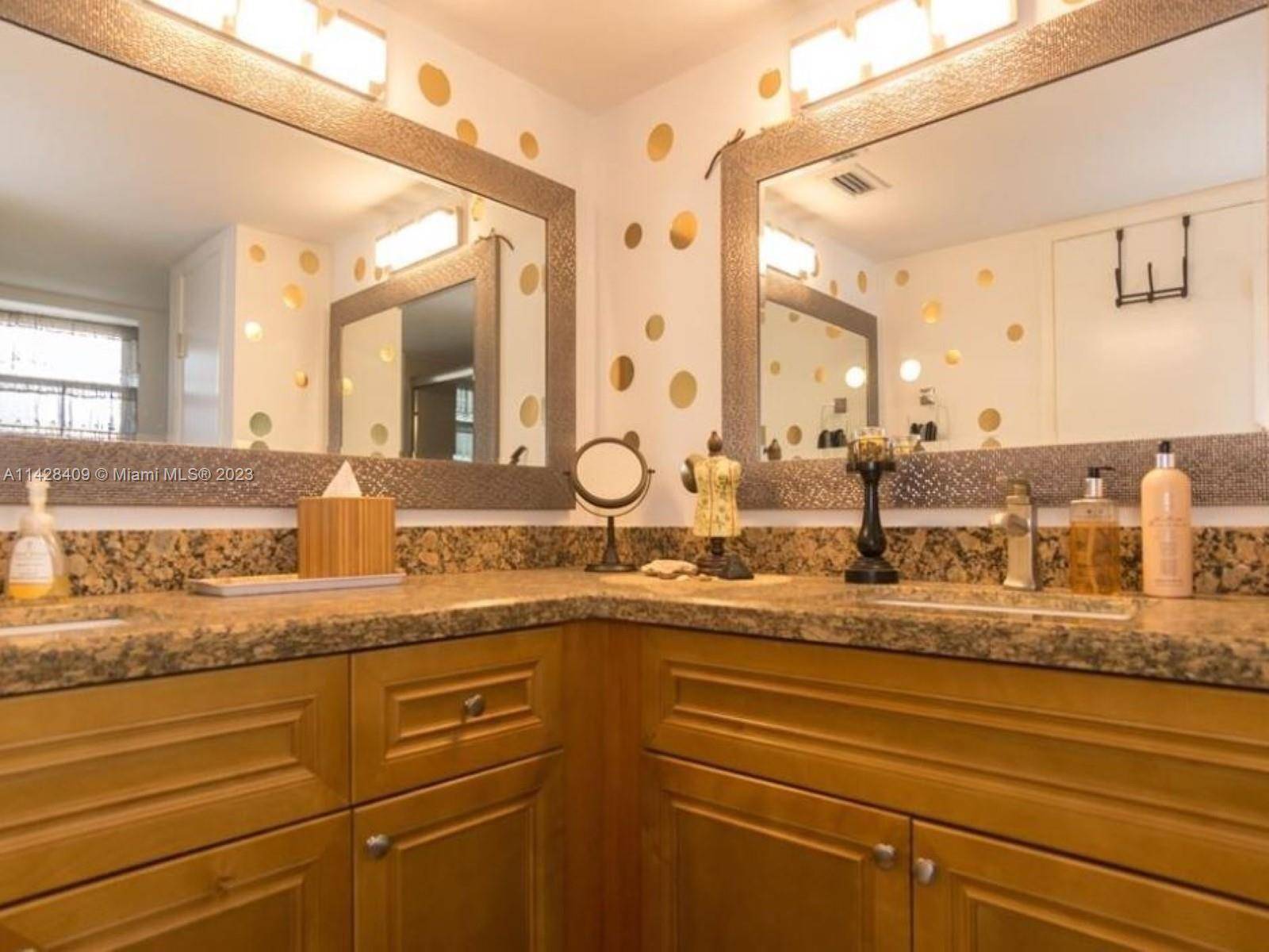 Welcome to this tastefully remodeled 2 bedroom, 2 bath corner unit featuring two screened balconies and delightful lake views.