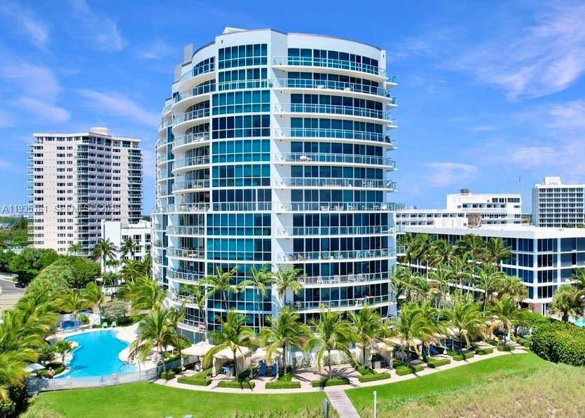 Your luxury oceanfront building directly on the sand, with its private, deeded beach area.