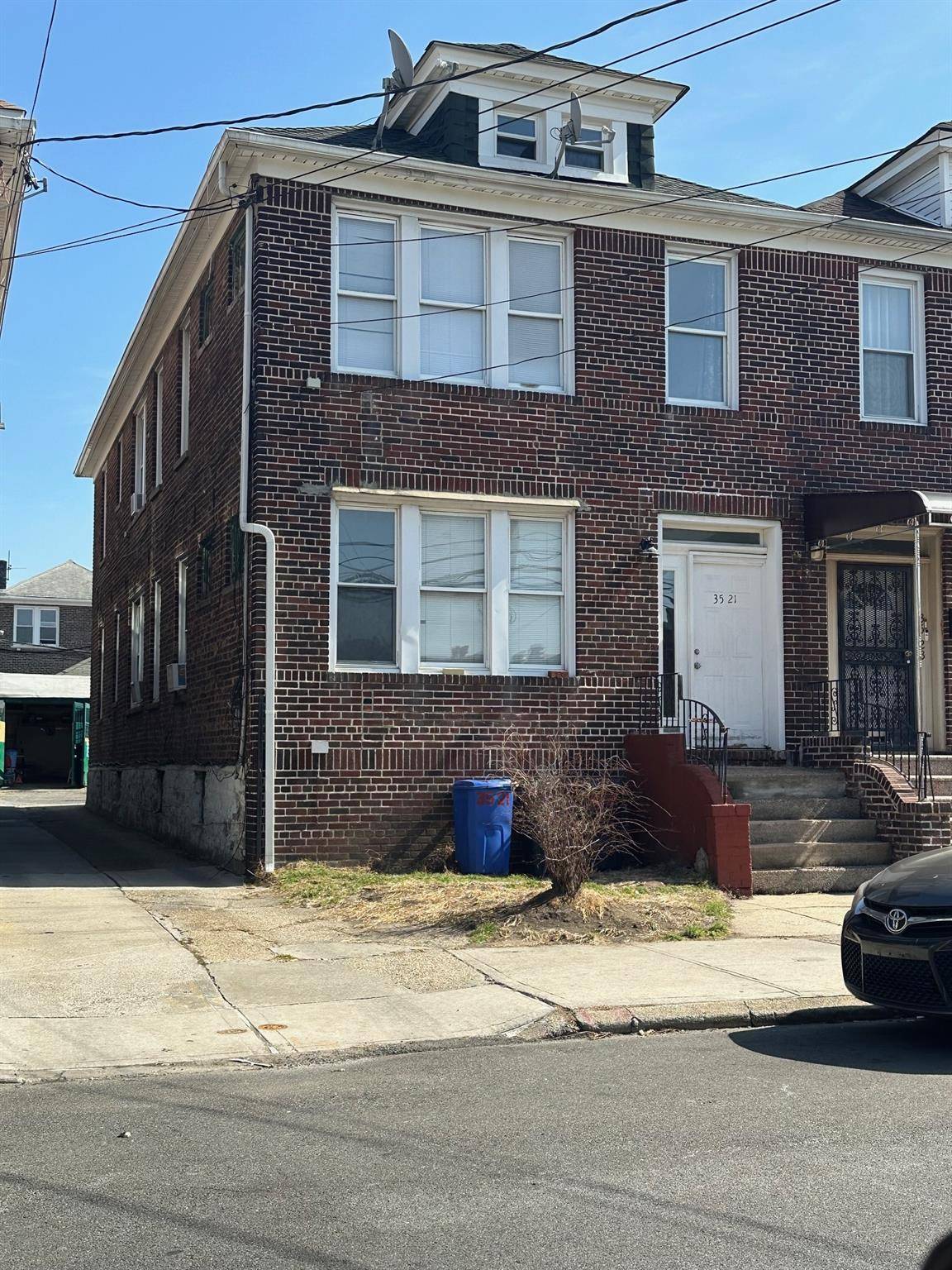 Legal 4 family, brick house off Broadway in Woodside.