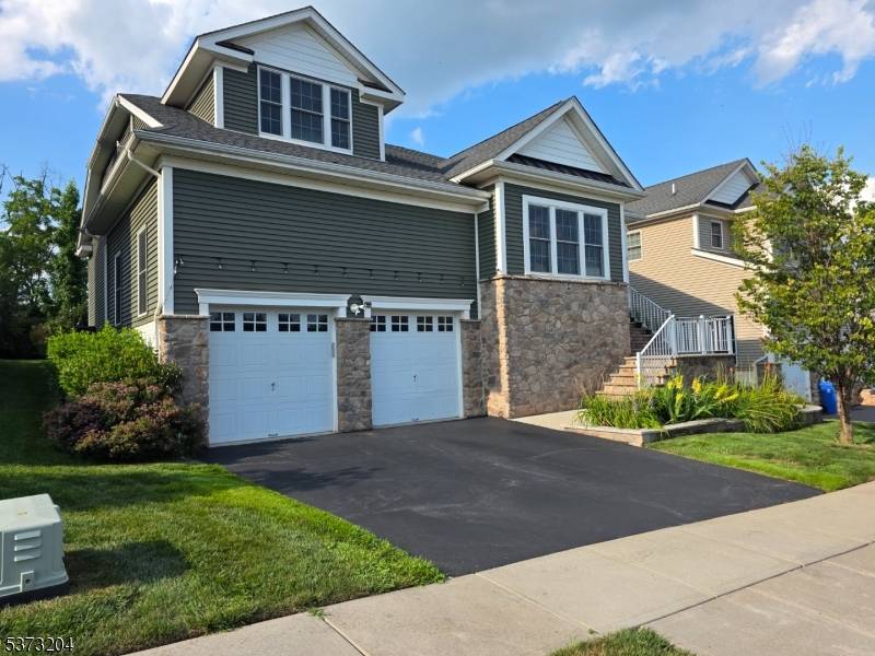 The property boasts an array of high end features, including expansive windows that bathe the interiors in natural light, enhancing the sense of space and connection to the outdoors.