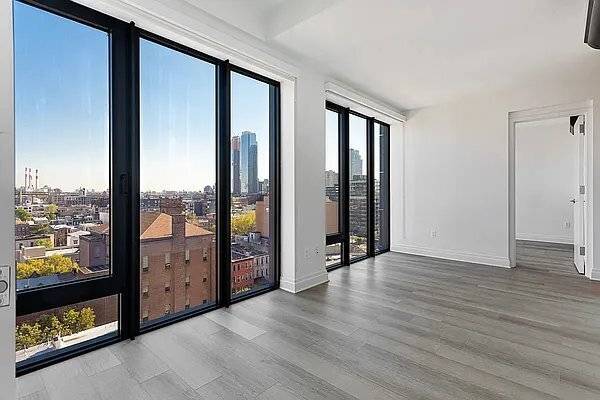 PENTHOUSE COLLECTION This is a spacious three bedroom penthouse apartment with a large terrace, unparalleled views of LIC, East River and Queensboro Bridge, and in unit washer dryer.