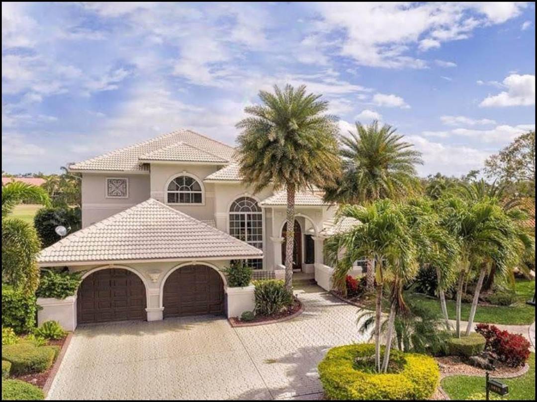 Experience a rare blend of elegance, comfort, and prime location in this one of a kind Coral Springs estate, located in the prestigious guard gated Eagle Trace community.