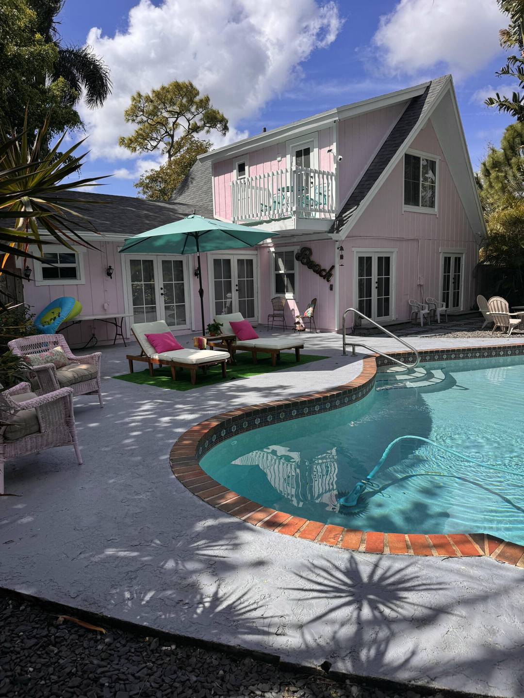 Fully furnished, spacious pool home available for rent, offering the perfect tropical vacation vibe on an oversized lot.