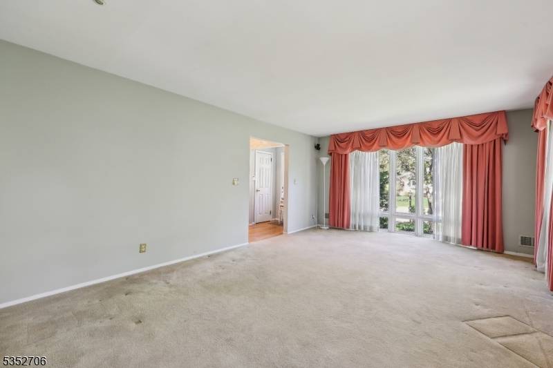 Large colonial with two bedrooms and full bath on main level with Kitchen that open into Family room with two skylights, sliders to large covered deck 15x24 with fan light ...