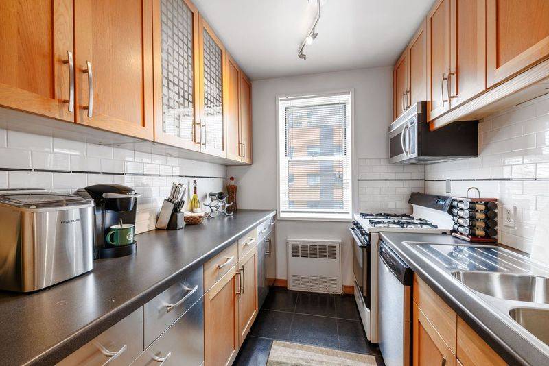 A HUGE ONE bedroom corner unit condo on the top floor in the heart of Chelsea, with access to a building parking garage.