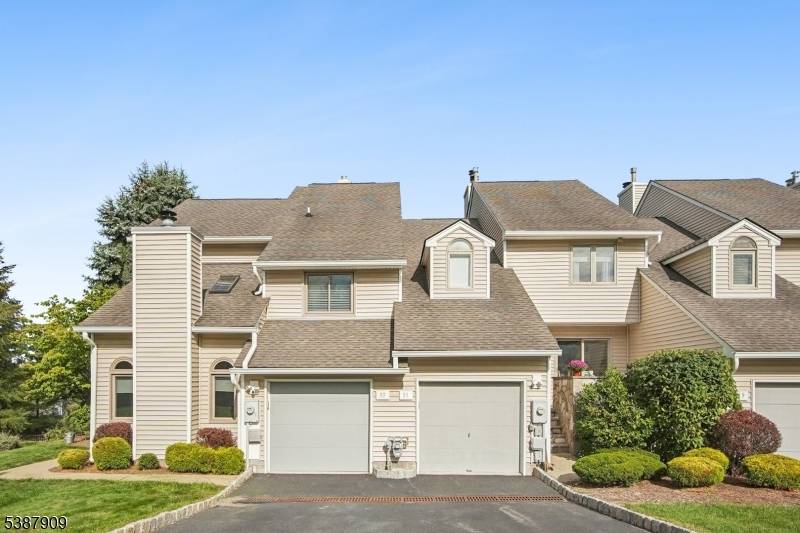 Welcome to one of the most desirable homes in West Essex Highlands a sunny, hilltop townhouse offering sweeping views and exceptional privacy.