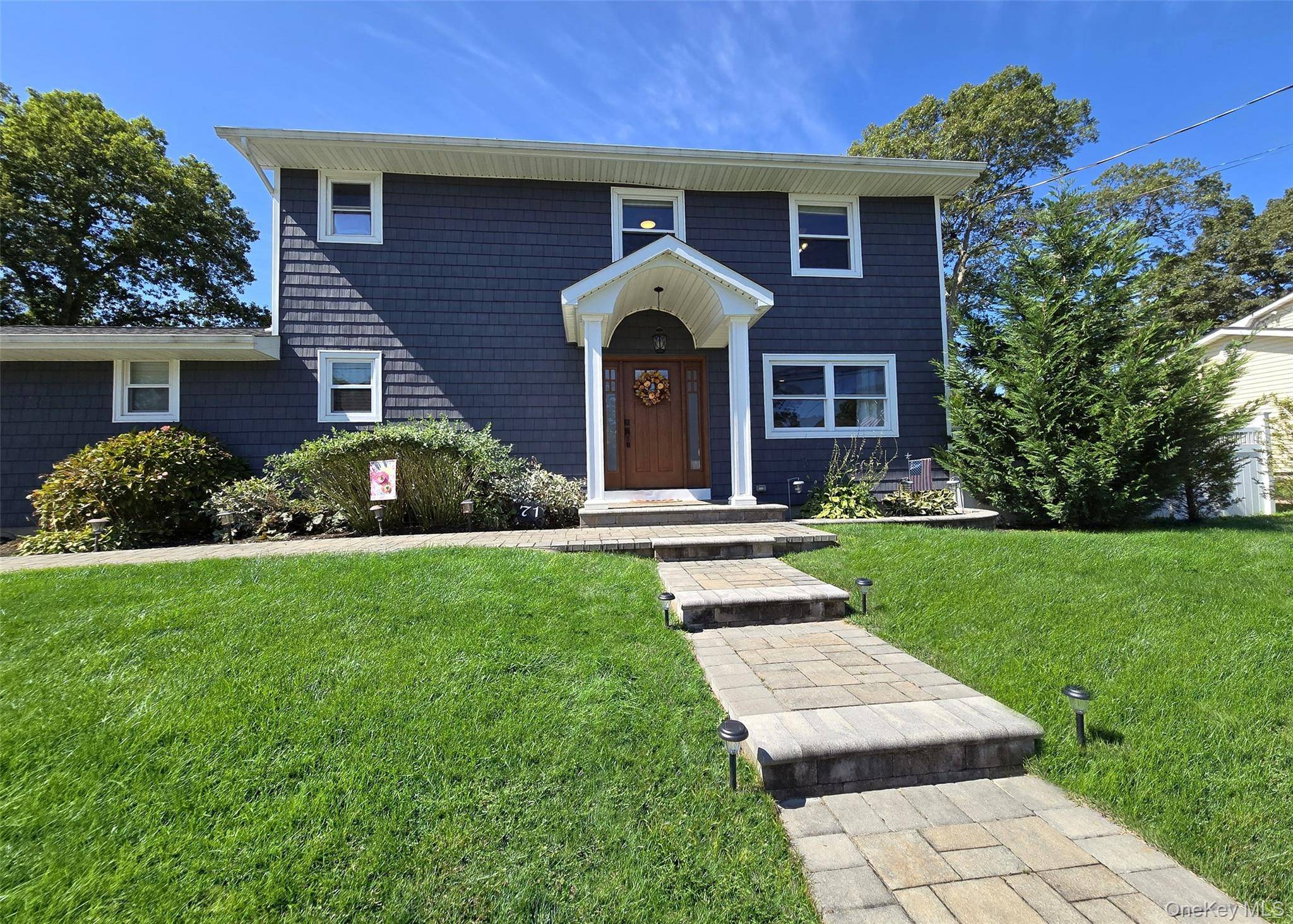 Welcome to this Spacious Colonial Which Features, Oversized Kitchen, Silestone Counters with Center Island, Top Of The Line Appliances, Double Fridge, Oak Floors, Updated Perfection Siding, Roof, Windows.