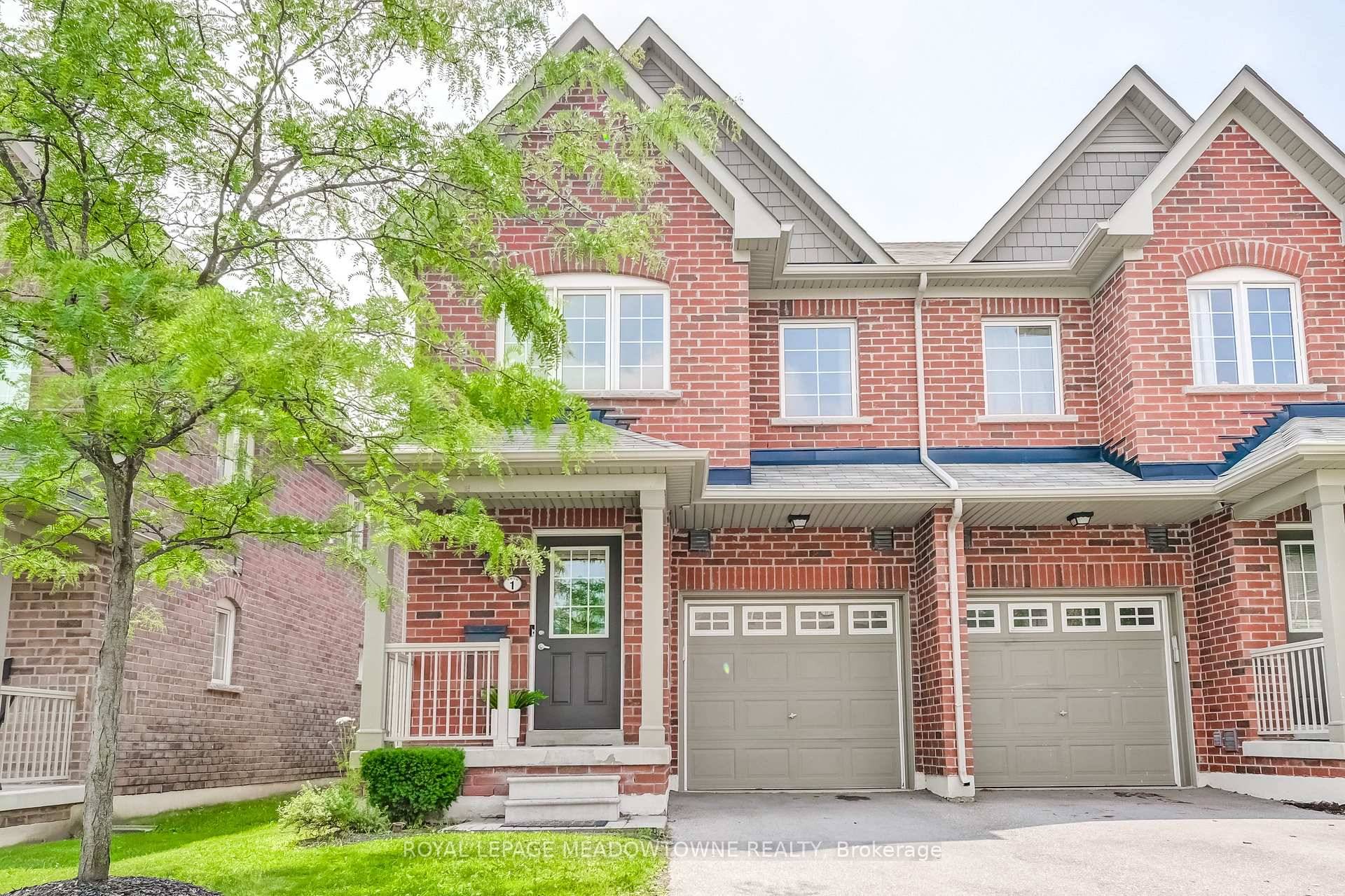 Welcome to this beautifully maintained end unit townhouse, built by Daniels and a former Daniels model home, located in the heart of the highly desirable Churchill Meadows community.
