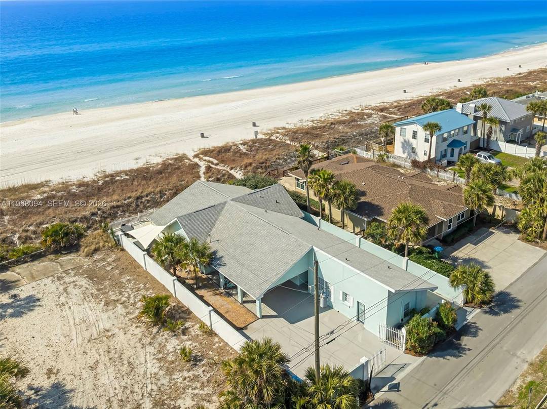 Incredible Gulf front, 4BR 4BA flex room beach home with proven rental income and a versatile multi generational split floorplan layout.