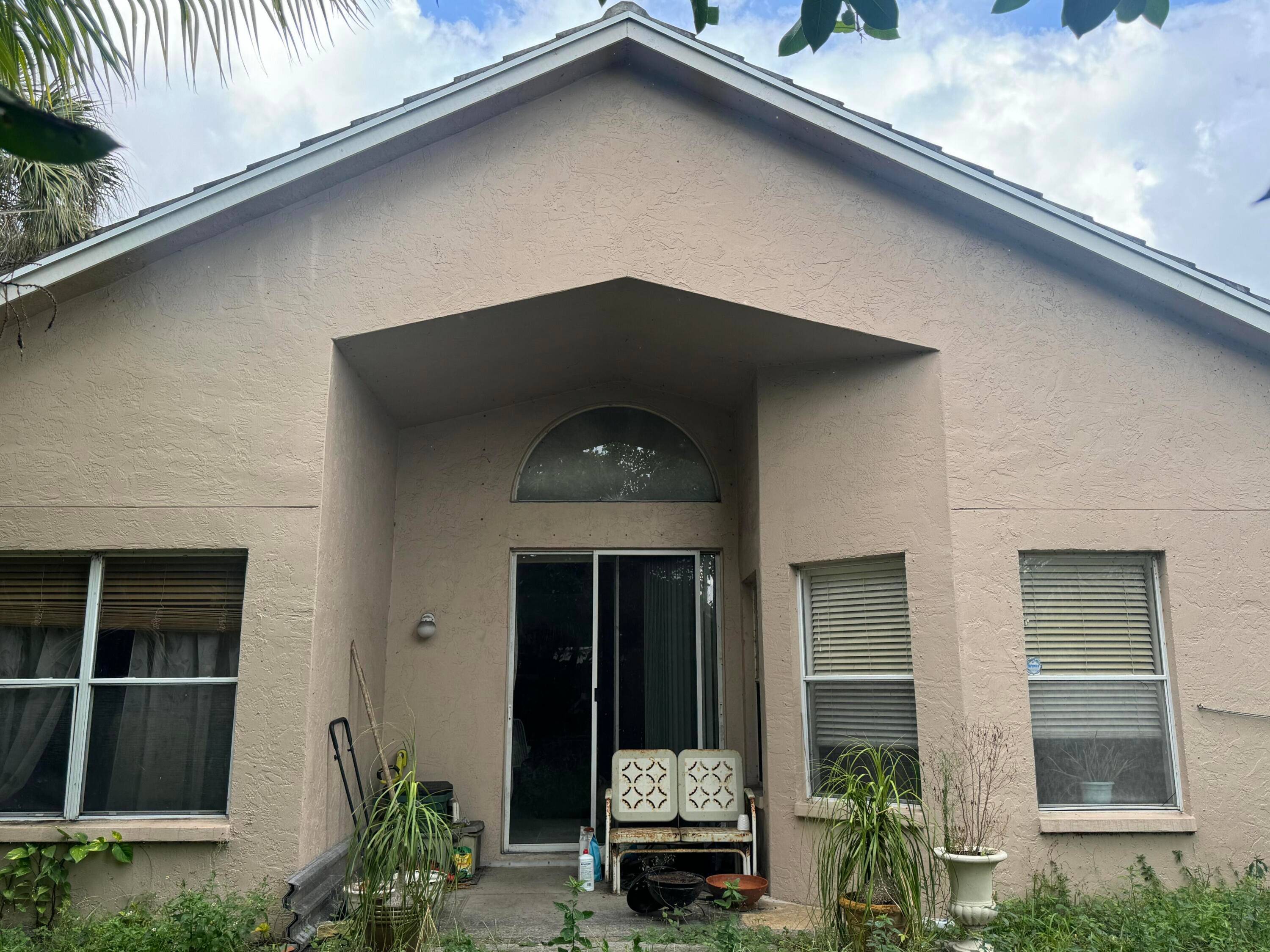 Concrete block home built in 1995 featuring 3 bedrooms, 2 bathrooms, and approximately 1, 600 sq ft of living space.