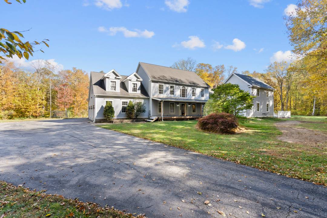 Set on 6. 16 acres across two separate lots, A fully attached legal in law ADU with full sized kitchen, 2 bathrooms, oil heat, mini split hookups, and separate entrance ...