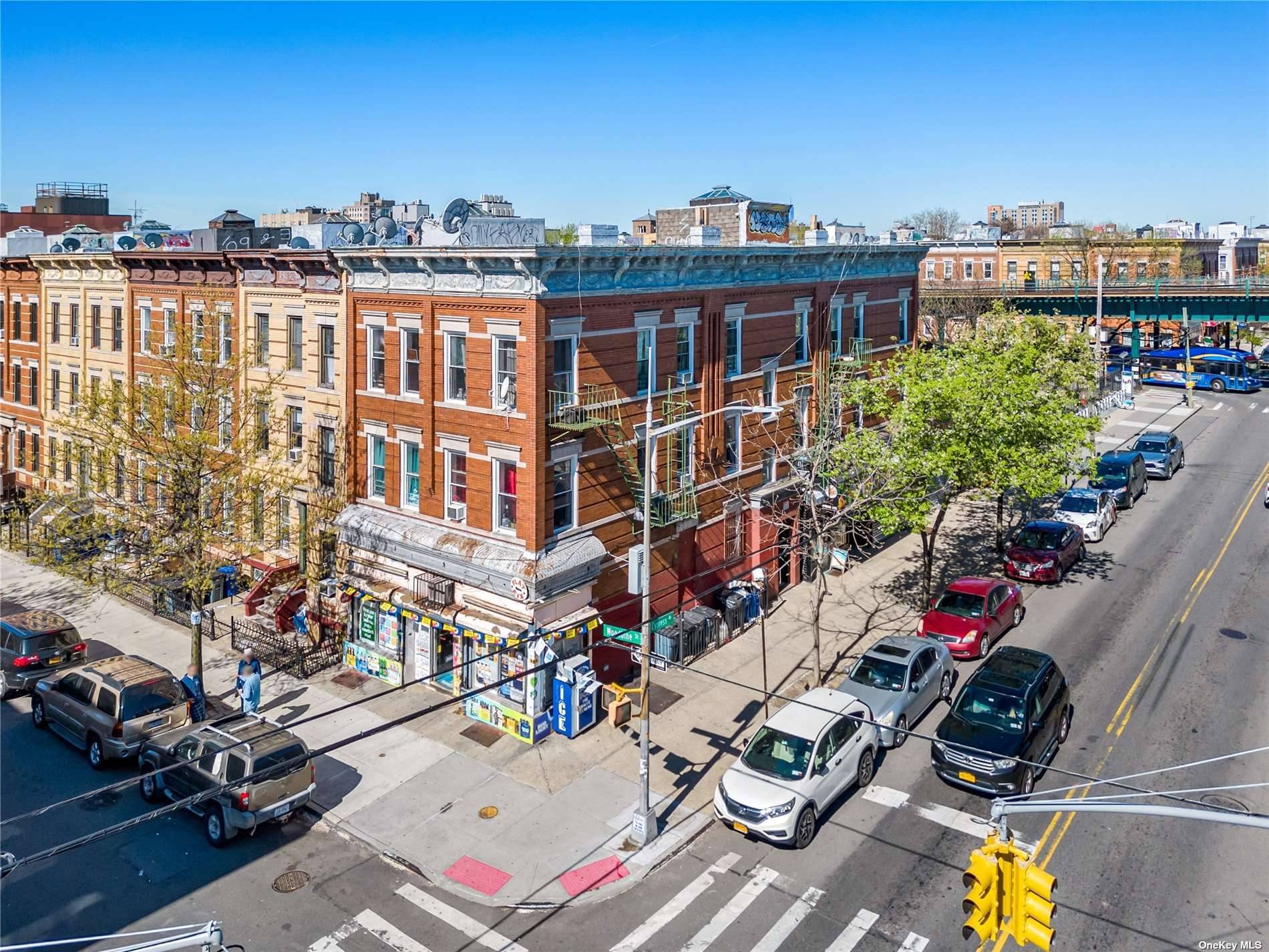 This meticulously renovated mixed use building, completed in 2023, boasts NINE FREE MARKET UNITS, comprising FOUR RESIDENTIAL and FIVE COMMERCIAL UNITS.