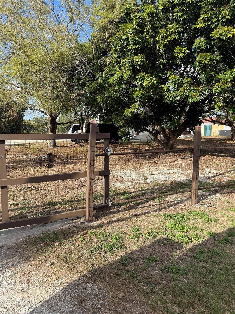 Exceptional and fully renovated estate in Homestead situated on an acre lot, featuring two separate single family residences.