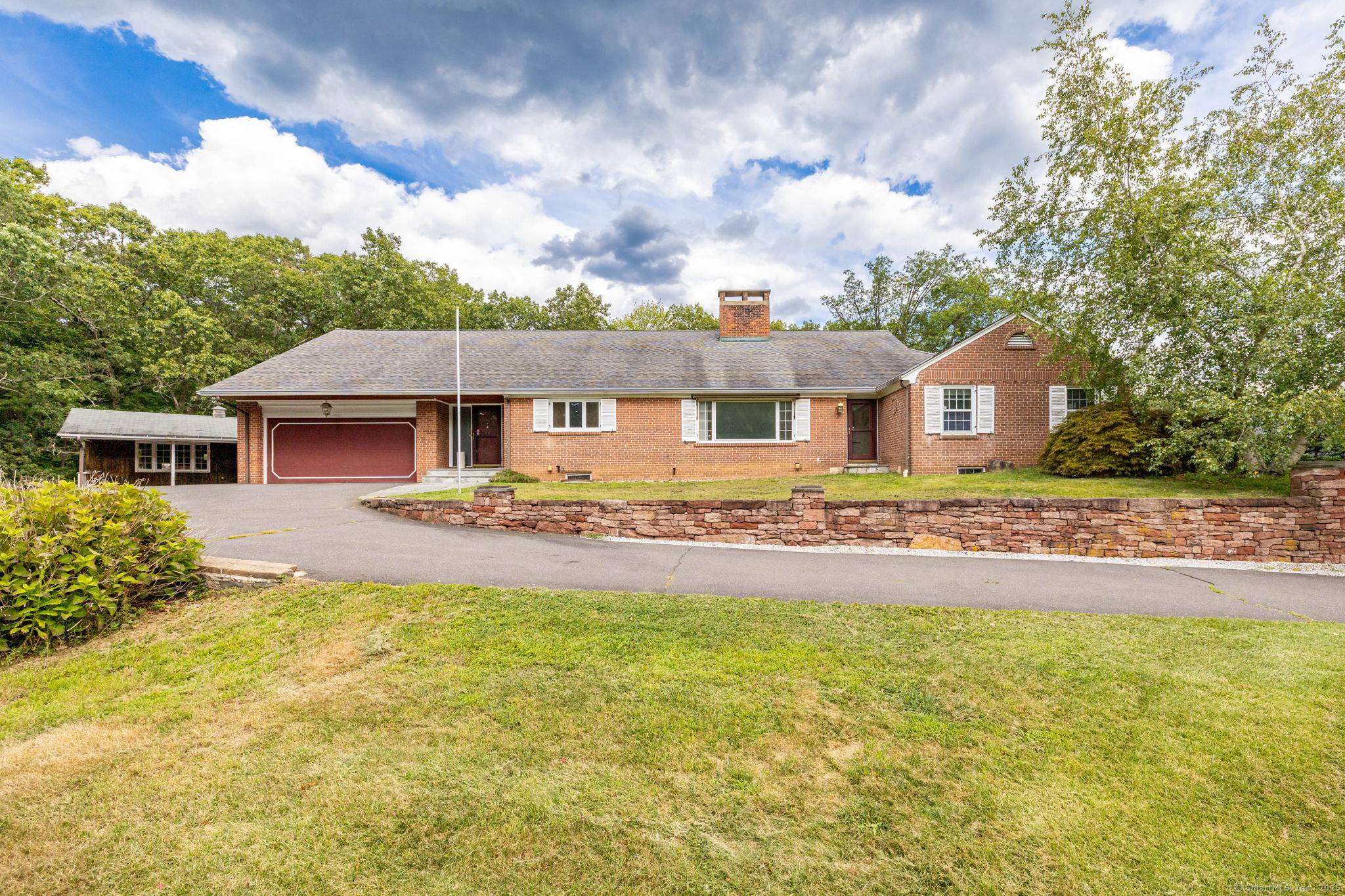 Discover a rare gem in prestigious Farmington a thoughtfully designed Contemporary Ranch offering unlimited potential on 3.