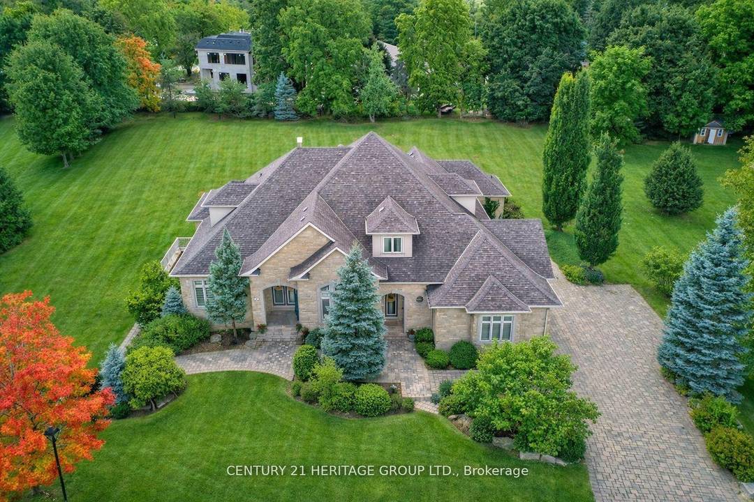 Welcome To One of King City's Most Distinguished Residences, a Rare Custom Built Luxury Bungaloft Estate Home offering 6 3 bedrooms, 8 bathrooms, and over 7, 000 sq.