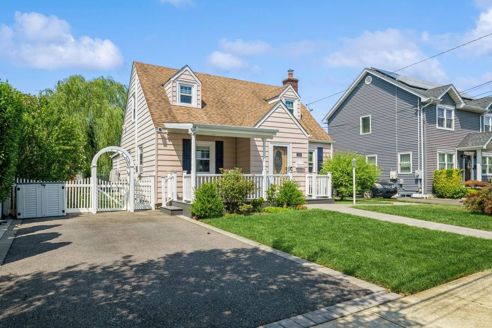 Welcome to this beautifully updated expanded Cape, ideally located mid block in a quiet, neighborhood within the Bellmore Merrick School District.