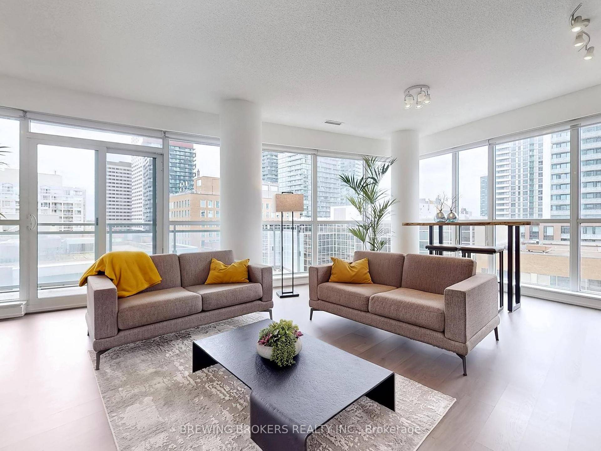Welcome to Suite 902 one of the largest and most sought after 1 Den layouts at The Madison, offering 794 sq.
