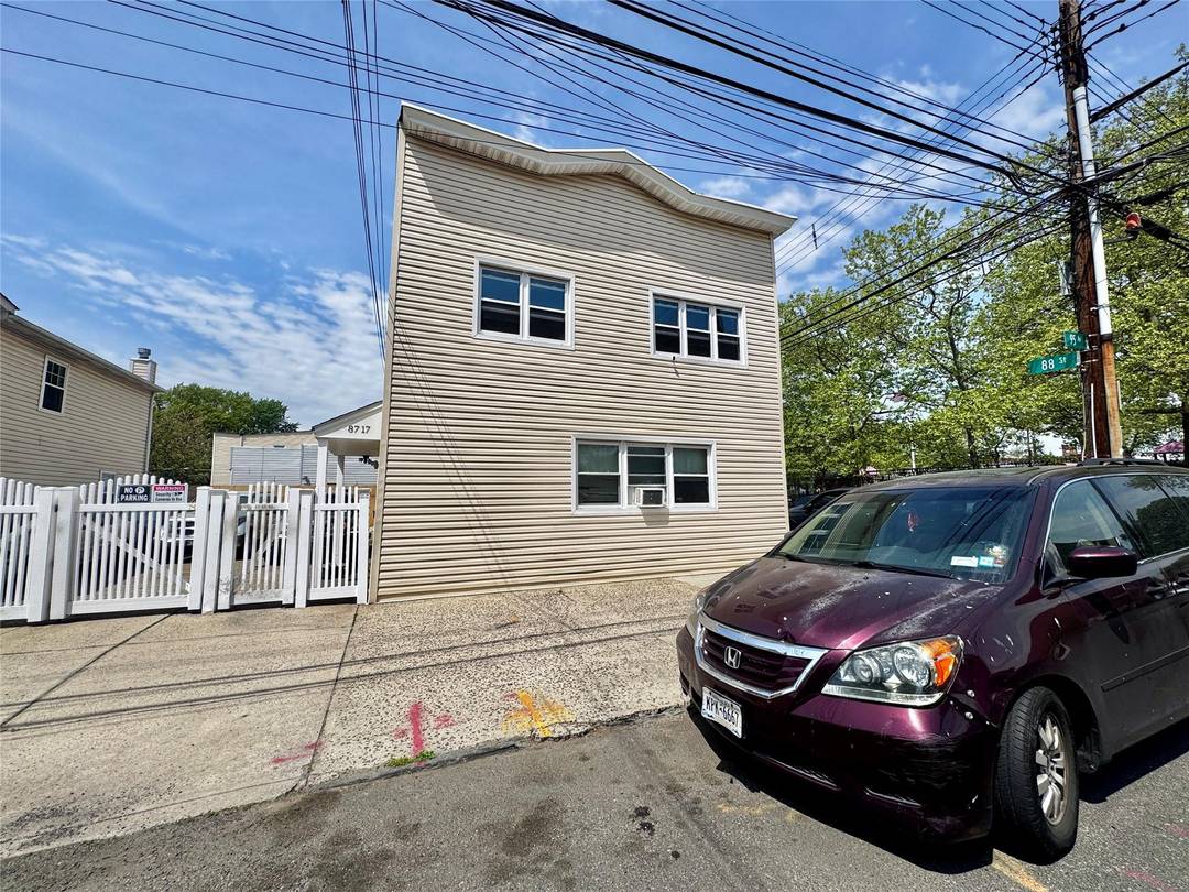 Well maintained 2 Family corner home in the heart of Ozone Park.