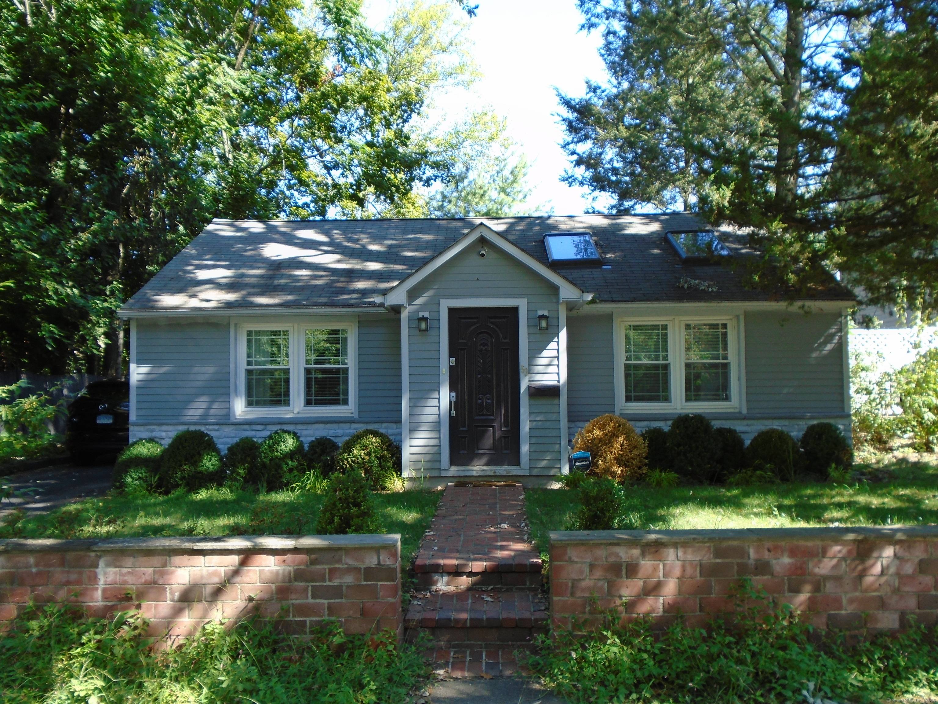 Welcome to this beautifully maintained single family residence nestled in the heart of Stamford's sought after Glenbrook neighborhood.