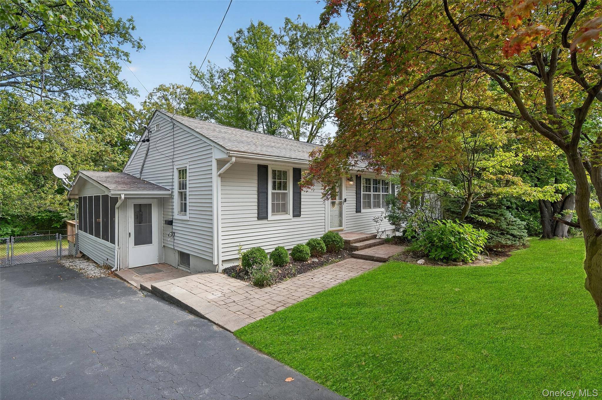 Welcome to this spacious home on a desirable corner lot in Cornwall, offering both convenience and potential.