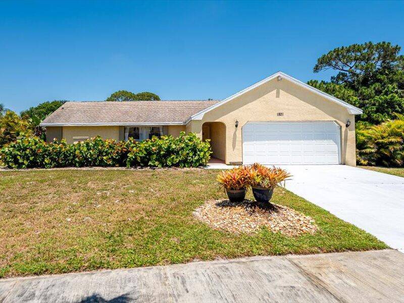 Sandpiper Bay ! This beautifully maintained 3 bed, 2 bath home w a 2 car garage on an estate sized lot, offering a blend of comfort, privacy resort style living.