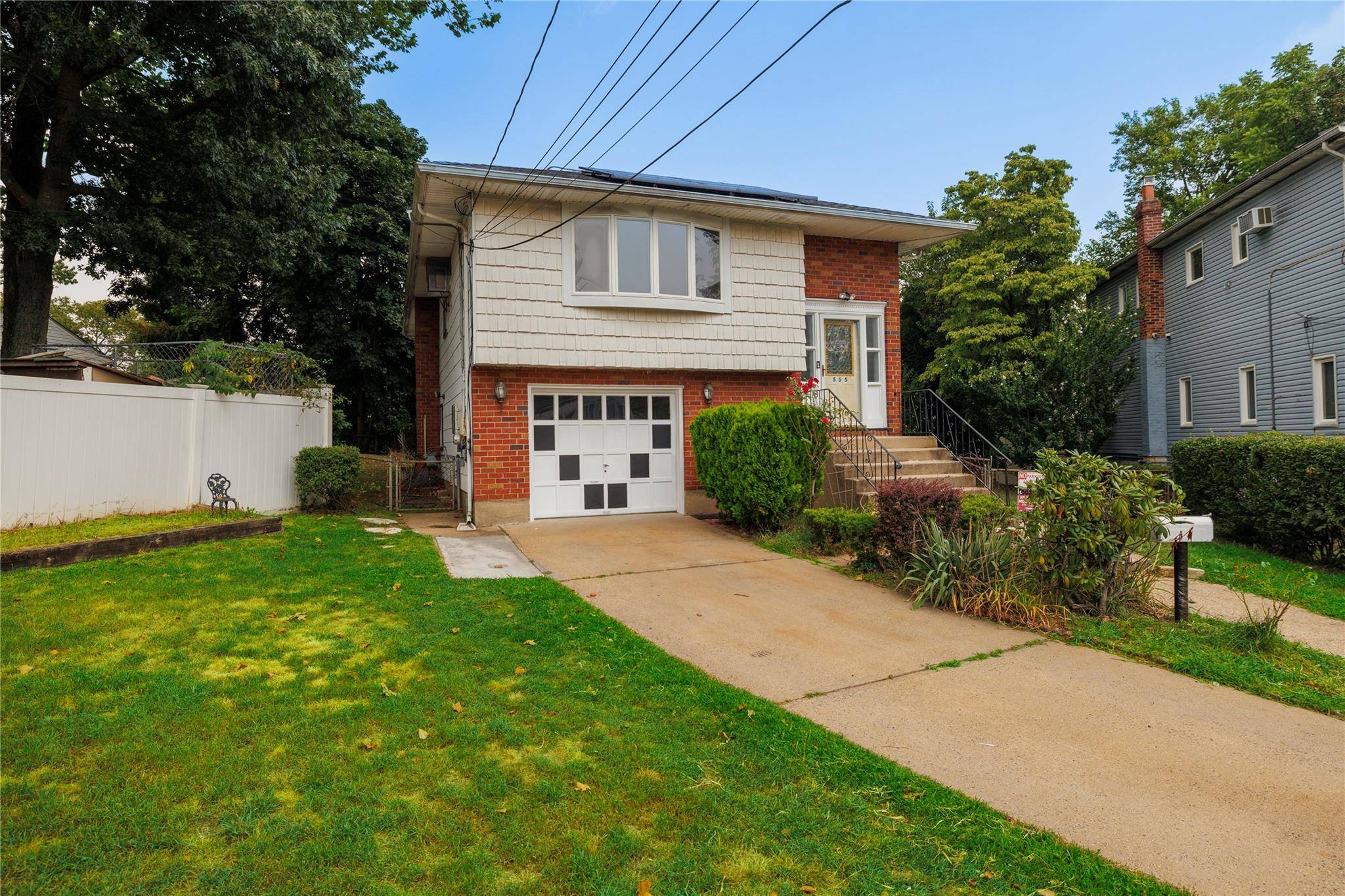 Located on a peaceful dead end street, this high ranch style home features three spacious bedrooms and two full baths, making it perfect for families of all sizes.