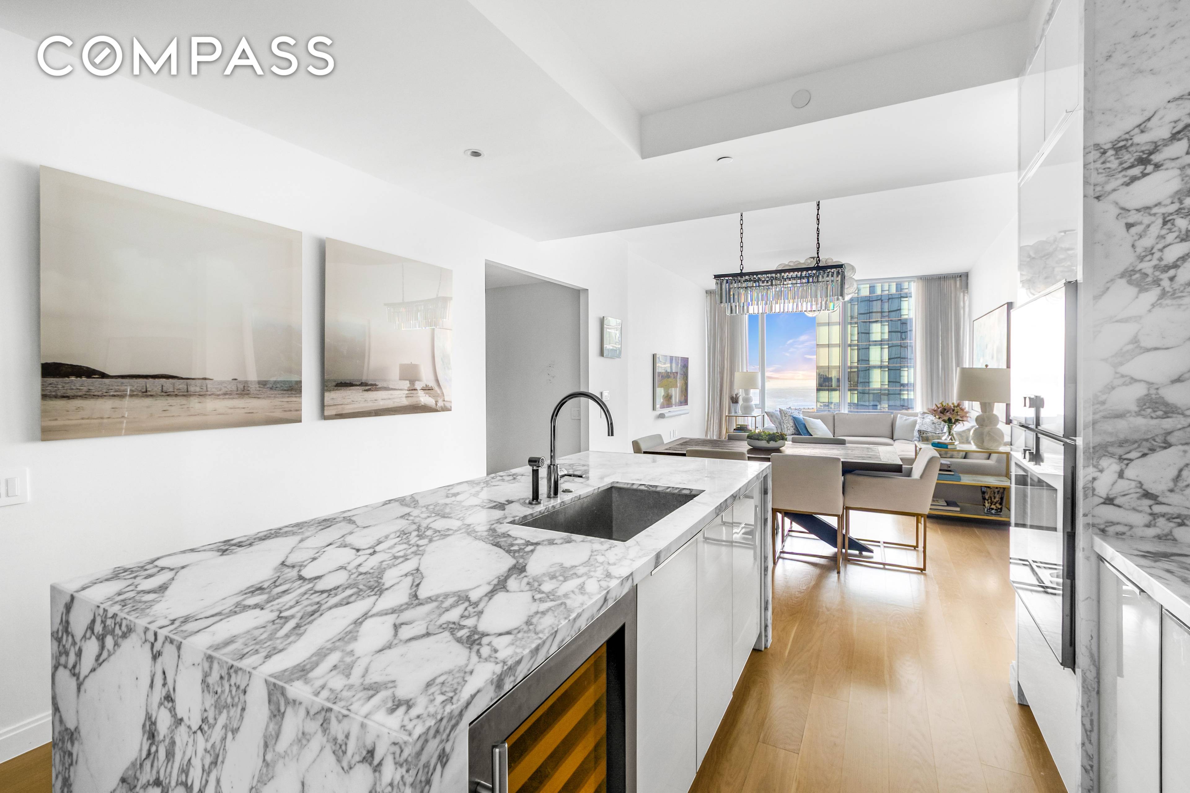 AMAZING 2 BEDROOM HOME OFFICE, 2 BATHROOM CONDO WITH A TAX ABATEMENT AND RIVER VIEWS !